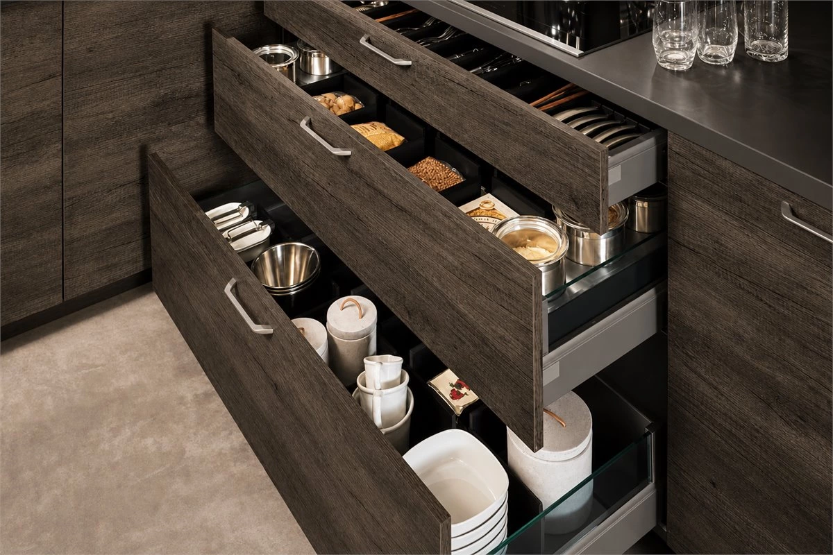 Open kitchen shelves paired with deep drawer base cabinets