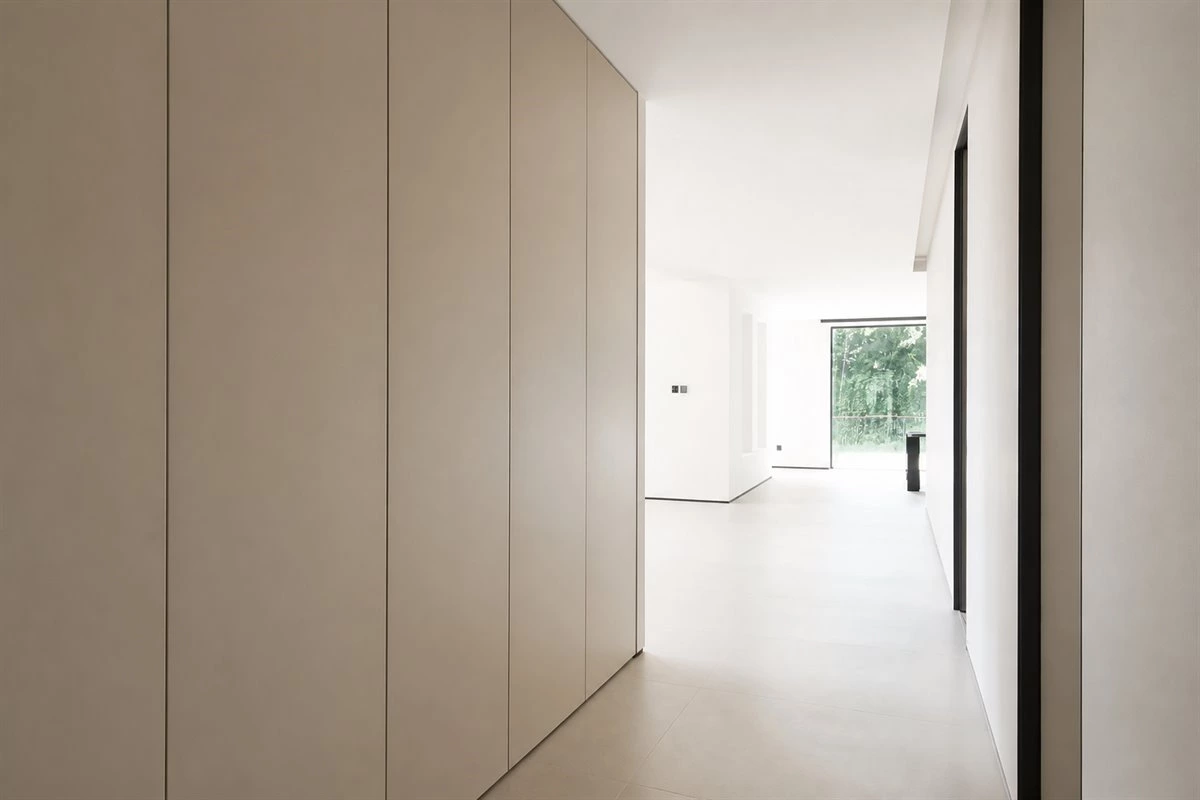 Handleless Entryway Storage Cabinet Handleless entryway cabinet with hidden storage and flush doors
