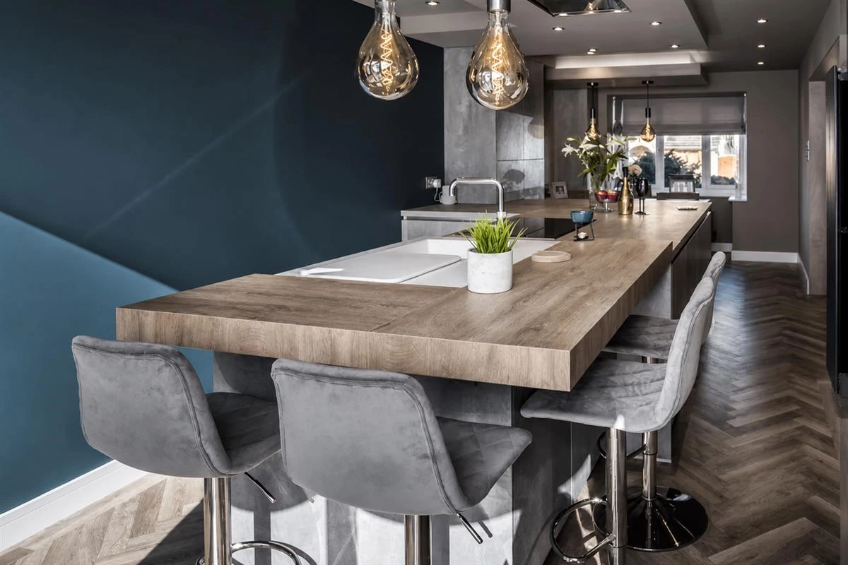 Kitchen bar counter with seating and integrated storage