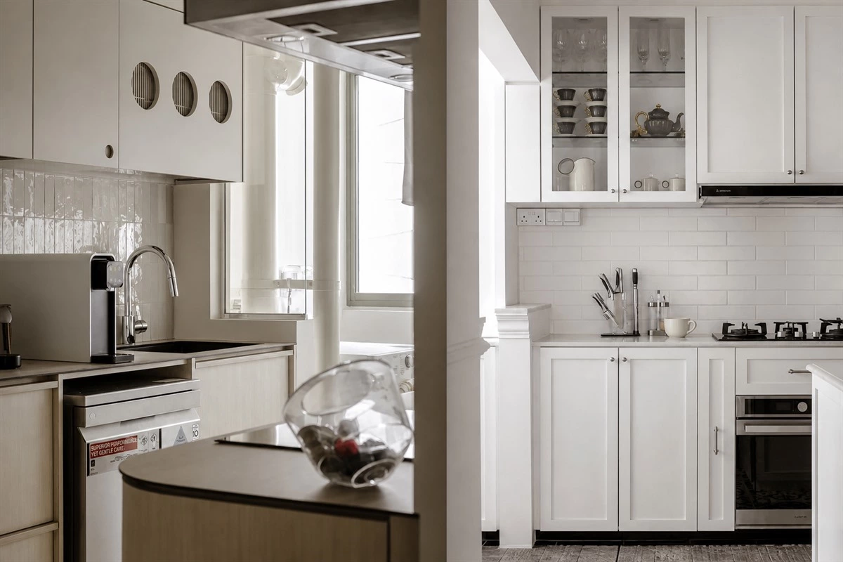 Closed appliance cabinet and concealed storage in a luxury kitchen