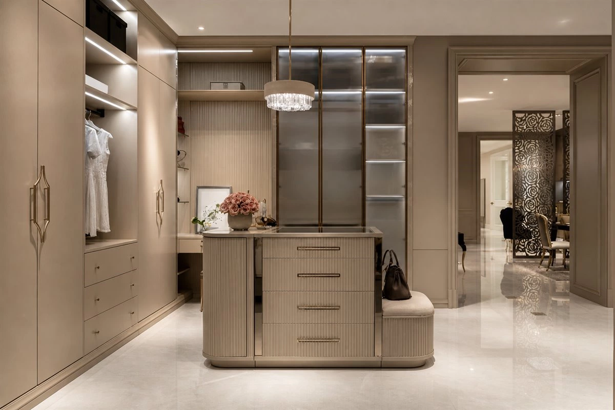 Open dressing room with wood glass storage and island Open dressing room with wood and glass wardrobes plus central island