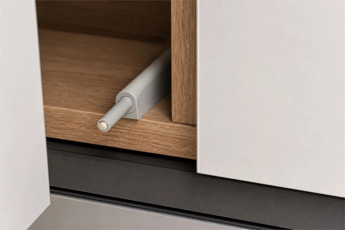 Push-to-open handleless cabinet doors with concealed opening hardware