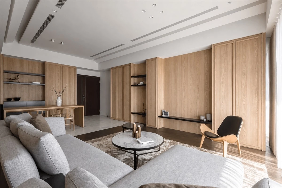 Custom cabinets matched with wall paneling for a cohesive interior