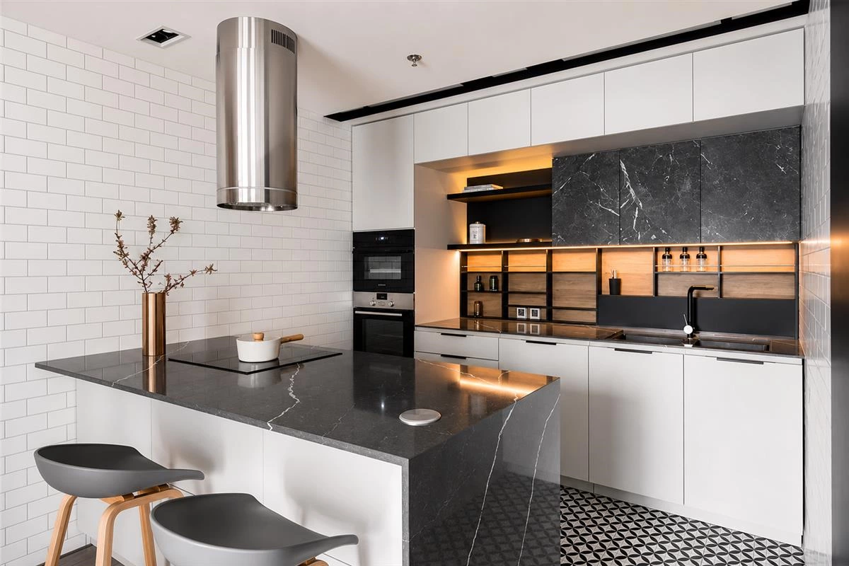 Full-height hidden pantry wall with custom kitchen cabinet storage