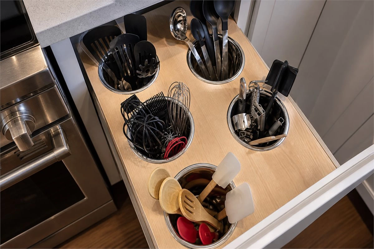 Pull-out ladle and spoon drawer organizer for kitchen base cabinets