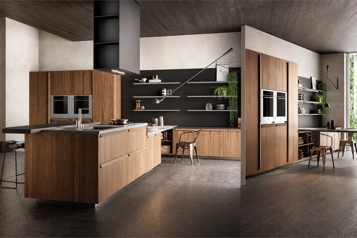 Large modern eat-in kitchen with island connected to dining table and bar seating