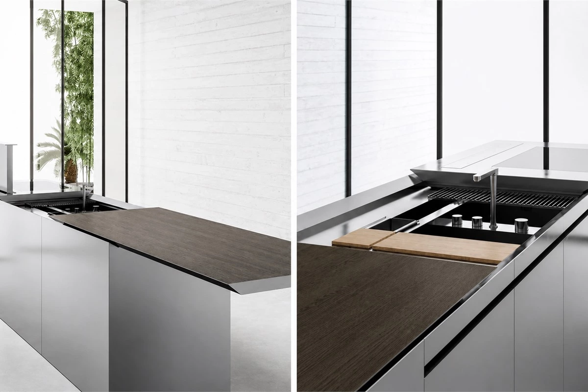 Versatile kitchen island concealing an induction cooktop sink and extractor hood