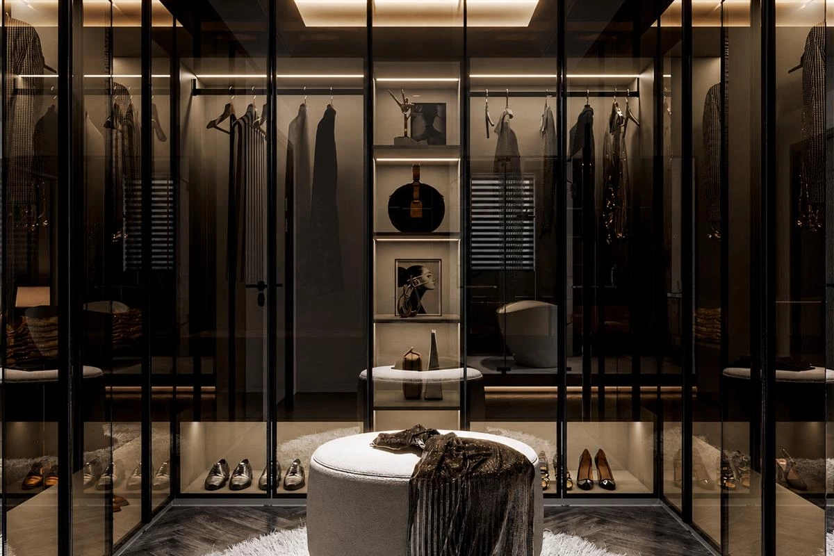 Clear walk in closet floor with wall mounted storage cabinets