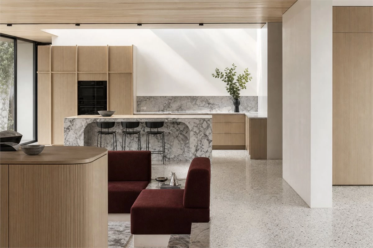 Layered wood stone leather and metal textures in modern home design