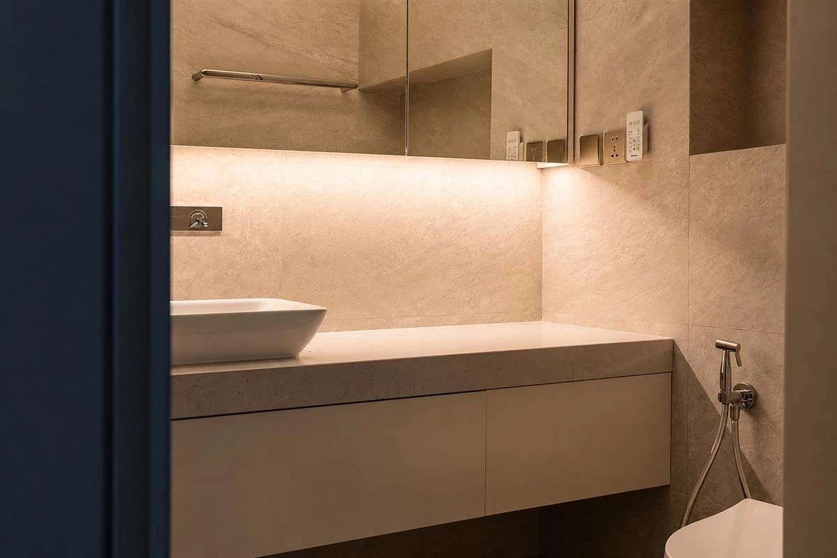 Hidden bathroom storage with mirror cabinet and under-sink drawers
