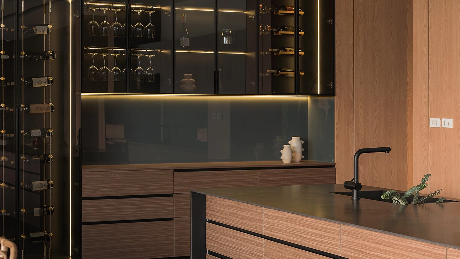 Stone matte lacquer wood veneer glass and metal cabinetry material detail