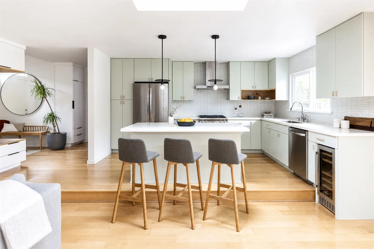 Mint green Japandi minimalist kitchen with ceiling-height cabinets