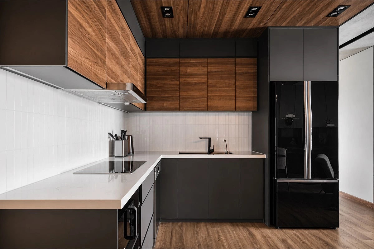 Warm neutral minimalist kitchen with coordinated cabinet colors and simple accessories