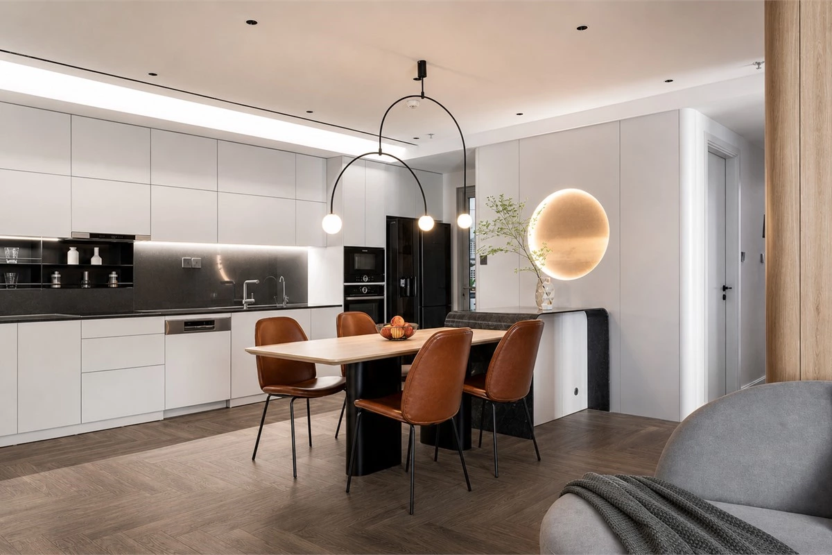 Streamlined minimalist kitchen furniture with handleless cabinets and restrained accessories