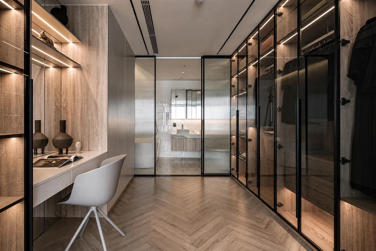 Custom cabinet interior with pull out storage and integrated lighting
