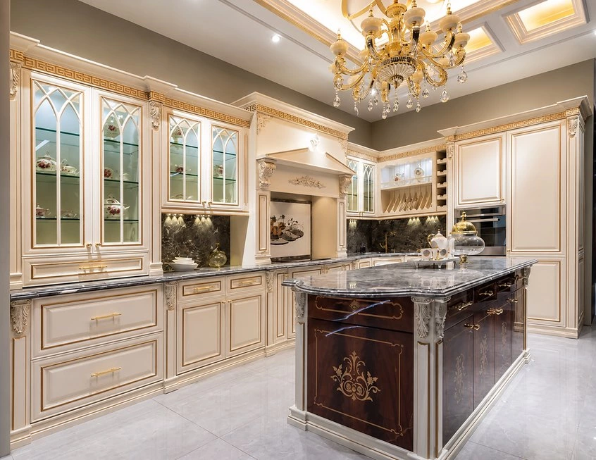 Classic cream kitchen with solid wood cabinets and marble island