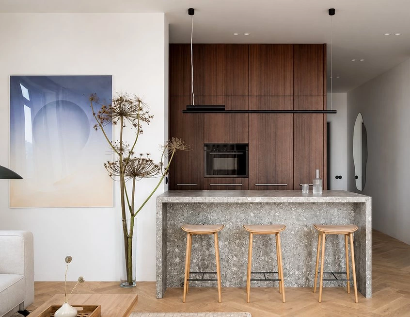 Small eat-in kitchen with wood and stone peninsula
