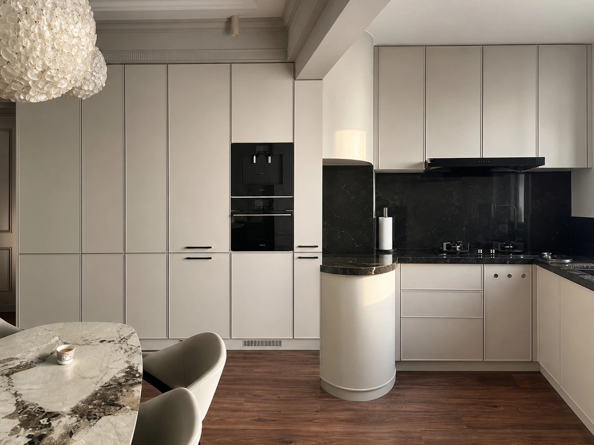 Wall-aligned soft white kitchen cabinets in the Guangzhou home