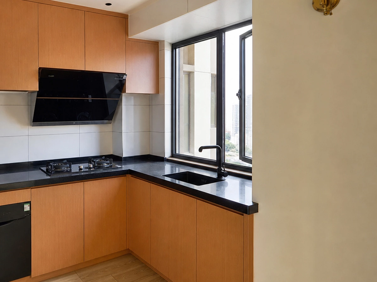 Daylight view of orange kitchen cabinets in the Zhuhai apartment