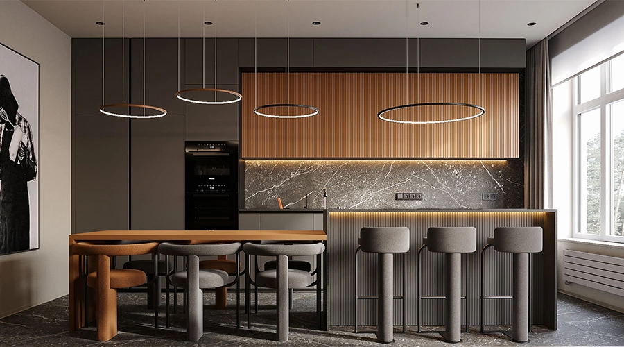 Silver-grey kitchen cabinets with wood slatted wall cabinets, bar seating and a connected dining table
