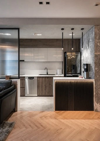 Walnut White Kitchen Cabinets with a Peninsula Bar
