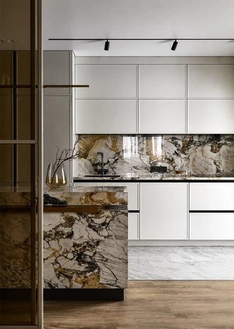 Matte Shaker Cabinets with a Marble Waterfall Island