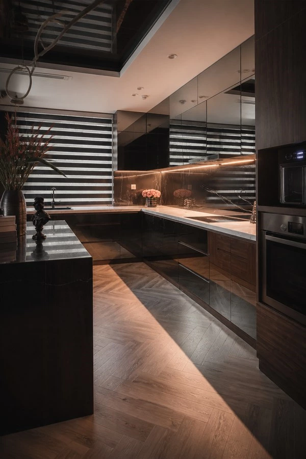 Mirrored Glass Kitchen Cabinets with an L-Shaped Island