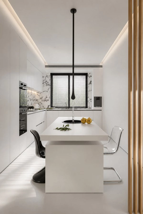 White U-Shaped Kitchen Cabinets with a Dining Island