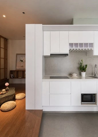 White Storage Kitchen Cabinets with Open Shelves and Tall Units