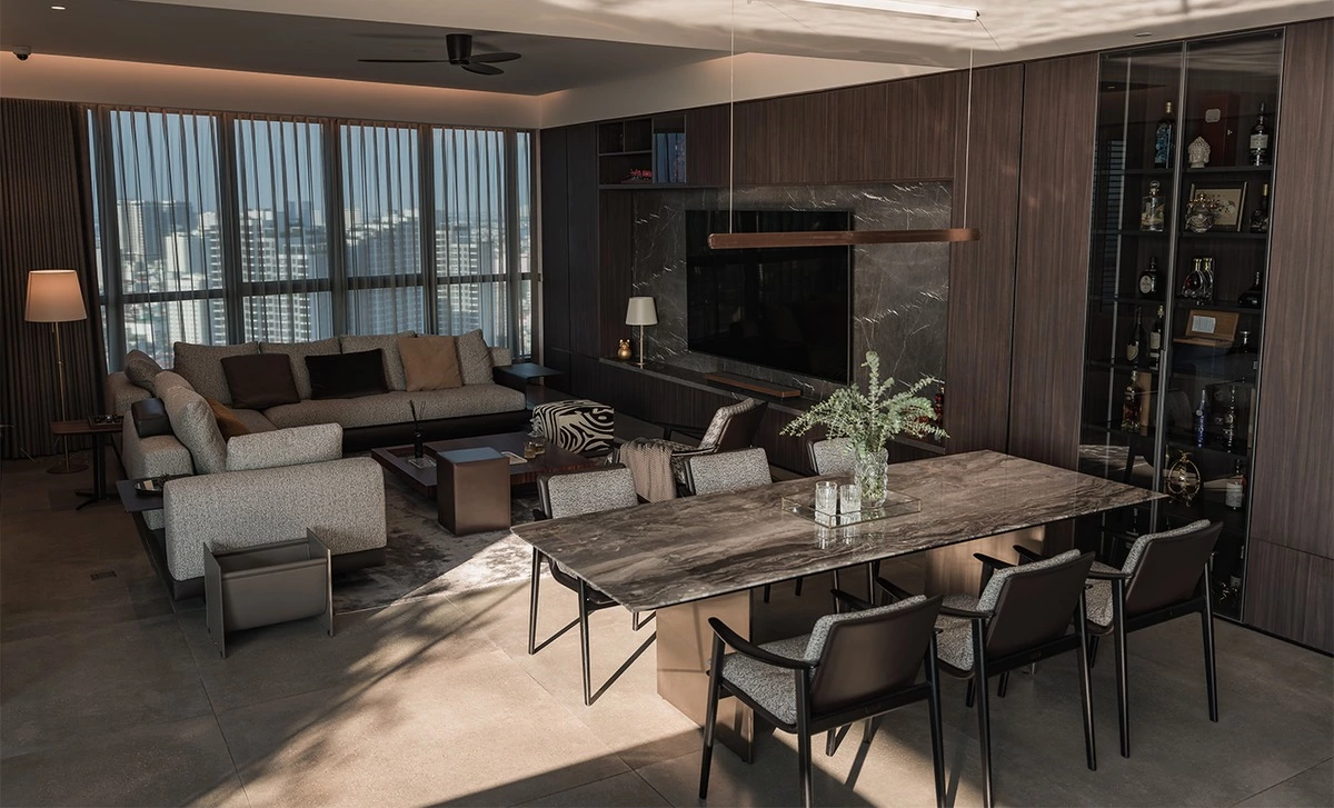 Walnut kitchen cabinets in a hotel-inspired open residence