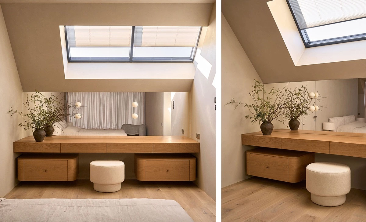 Light timber dressing table with drawers and mirror beneath a skylight